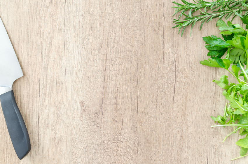 fresh herbs on a cutting board