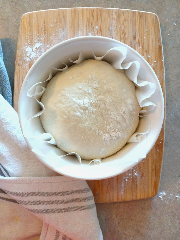 bread dough going into the oven.